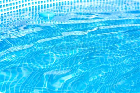 Background Of Bright Blue Clear Water In The Pool Stock Photo Image