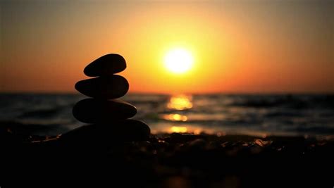 Stones Pyramid On Beach Symbolizing Zen Harmony Balance Sea At