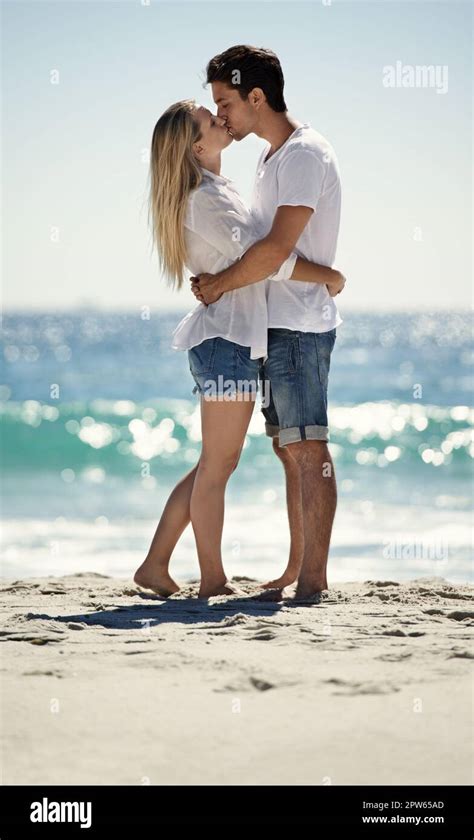 More Than Just A Summer Romancea Happy Young Couple Embracing On The