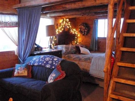 In keeping with the cottage feel, the designer of this home has chosen lots of small lighting rather than one large centerpiece. Small Cabin Interiors | Sagewood Cabins: Interior of cabin ...