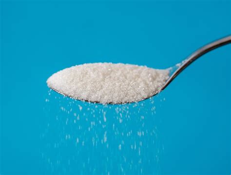Sugar Pouring From A Spoon Stock Image Image Of Glucose 125866395