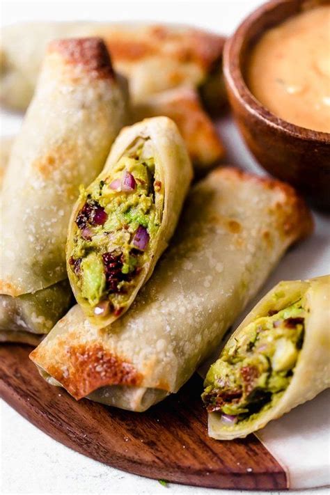 Baked avocado egg rolls with only 6 ingredients! Avocado Egg Rolls with Sweet and Spicy Dipping Sauce ...