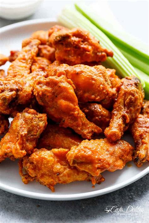 They are traditionally served hot, along with celery sticks and carrot sticks with blue cheese dressing or, primarily outside of new york, ranch dressing for dipping. Crispy Buffalo Chicken Wings (BAKED) - Cafe Delites