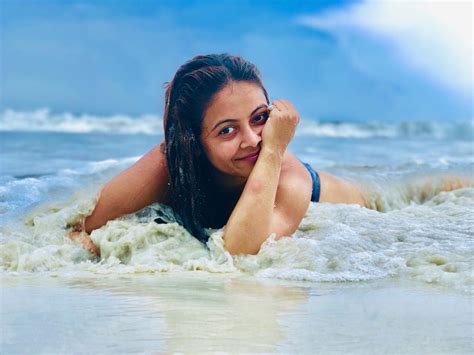 Devoleena Bhattacharjee Raises Temperature In Red And White Striped Bikini See The Tv Diva S