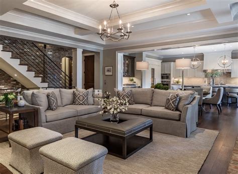 The sliding door closes off either side of the storage cabinet to incorporate both open and closed storage space. Traditional Farmhouse style living room in grey and beige ...