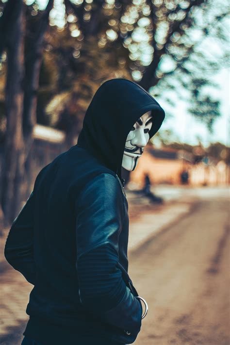 Man Wearing Hoodie And Mask · Free Stock Photo
