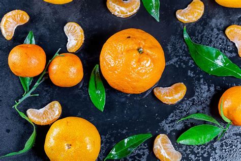 Fresh Mandarin Oranges Fruit With Leaves On Dark Table Creative