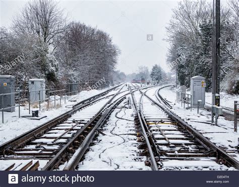 Snow Covered Railway Lines At The Strawberry Hill Rail Station After A