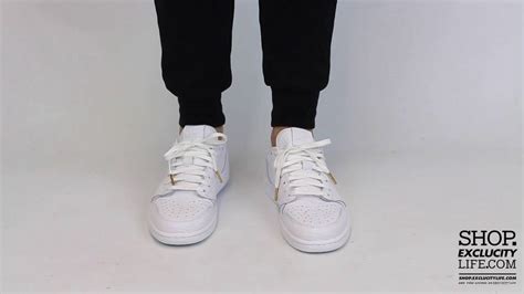 Usually crafted from smooth leather with perforations on the toe box, the air. Air Jordan 1 Retro Low Swooshless White White On feet ...