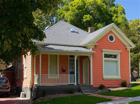 The color is named after the sea animal also called corals. Salmon Colored House | Beach house colors, Coral house ...