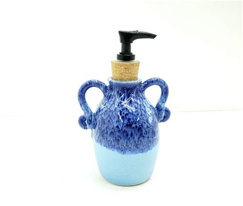 Blue Delight Ceramic Soap Dispenser with handles (With ... This white ceramic soap dispenser from the designer home range by ben de lisi comes in a dog design with a silver pump top.