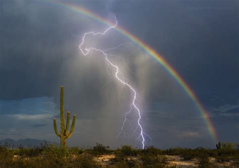 Photographer Captures Rainbow And Lightning Bolt In One Electrifying Image