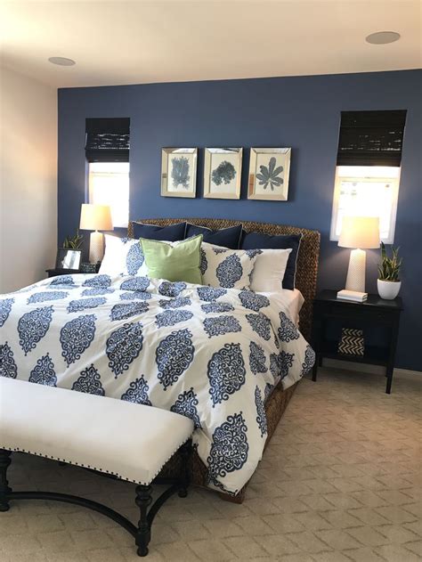 For a contemporary bedroom, a good idea is to use darker colors with white accents. Dark blue accent wall | Blue master bedroom, Blue accent ...