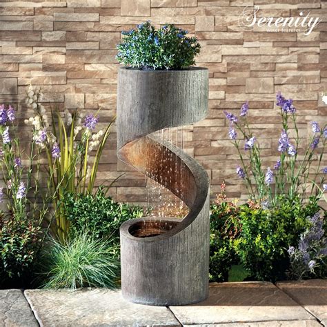 Click to add item enchanted garden™ 64.1 tiered shady brook outdoor water fountain to the compare list. Serenity Spiral Cascade Water Feature Planter LED 79cm ...