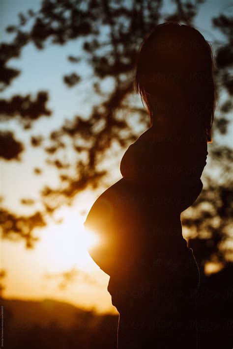 Pregnant Woman In Sunset Del Colaborador De Stocksy Dimitrije Tanaskovic Stocksy