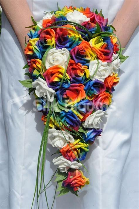 We would like to show you a description here but the site won't allow us. Colourful Artificial Rainbow Rose Wedding Cascade Bouquet ...