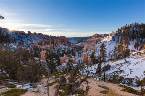 Sunset Over Canyon Slopes Covered In Snow Bryce Canyon National Stock