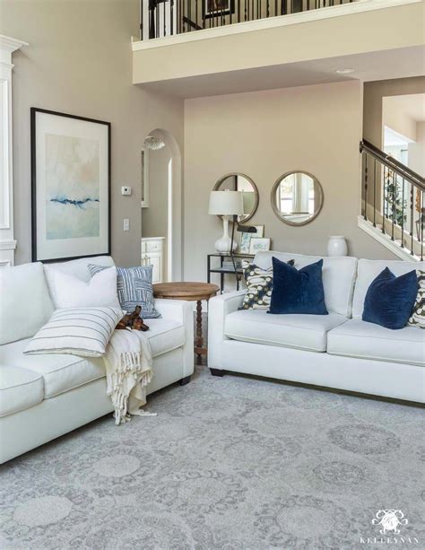 Neutral Living Room With Blue Accents White Sofas With Blue Throw