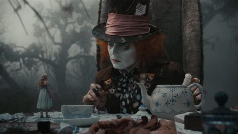 Johnny Depp As Mad Hatter Images Alice Glass Looking Through Trailer Poster Idteknodev