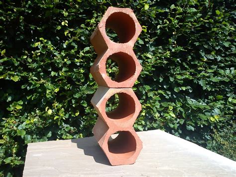 We carry a large selection of wine racks for your home bar, kitchen or living room. 2 Hole Wine Rack - Hexagonal - Terracotta World