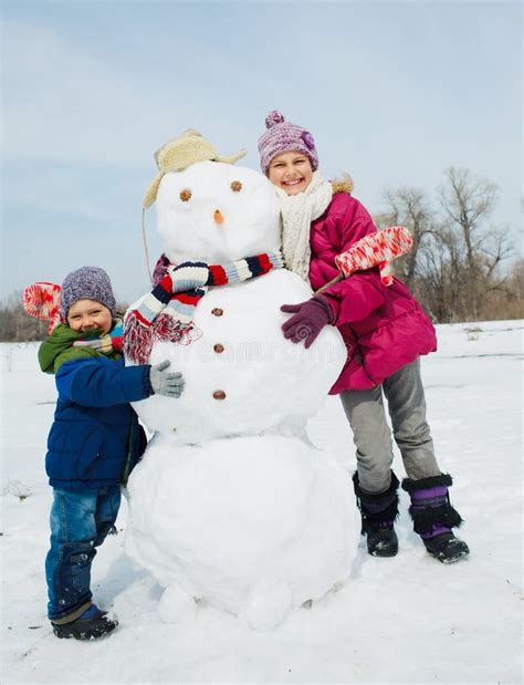 Kids Make A Snowman Stock Photo Image Of Childhood Build 33416514