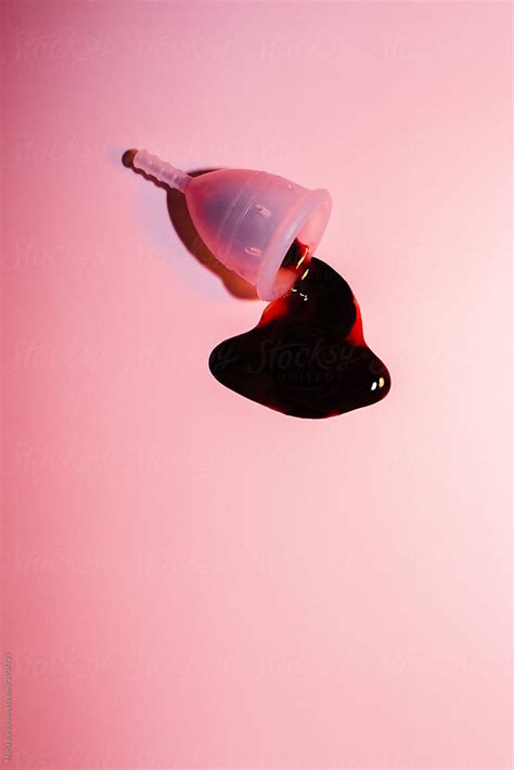 Menstrual Fluid Spilled From The Menstrual Cup By Stocksy Contributor