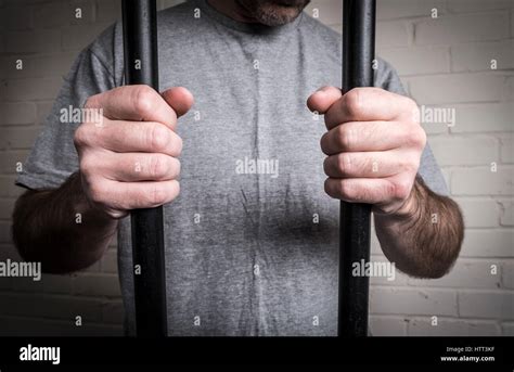 Prisoner Behind Bars Hi Res Stock Photography And Images Alamy