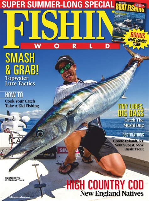 A Man Holding A Big Fish On The Cover Of Fishing World Magazine Which