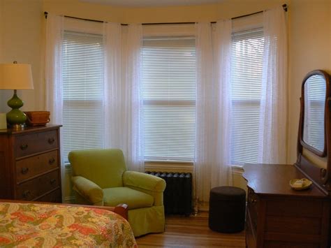 For a living room that brings the outdoors inside, it softens the rustic style by being just sheer enough to diffuse light as it comes through the window. 15 Best Ideas Curtains for Round Bay Windows | Curtain Ideas