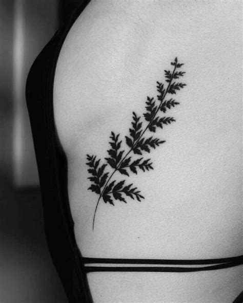 Black Leaves Tattoo Inked On The Left Rib Cage Ink Tattoo Small