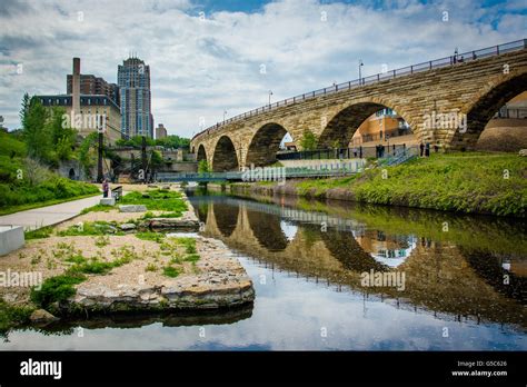 The Stone Arch Bridge In Downtown Minneapolis Minnesota Stock Photo