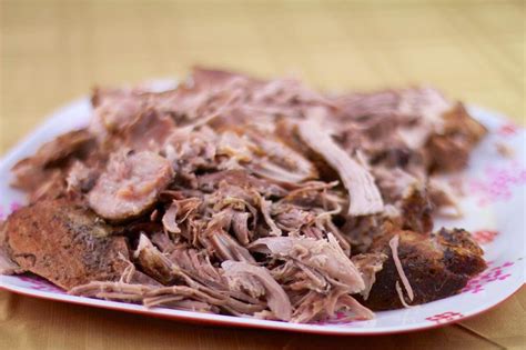 Remove roast, using two forks shred meat to blend in onions.at this time taste to see if you need to adjust seasonings. Traditionally Brined Crockpot Pulled Pork Shoulder ...