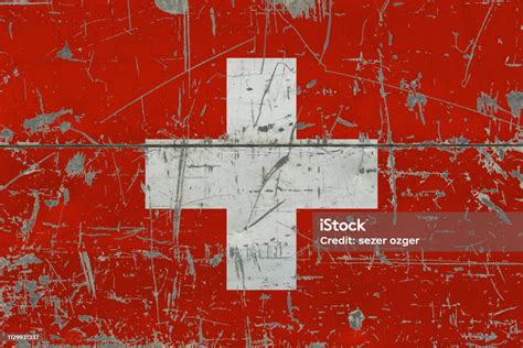 Grunge Switzerland Flag On Old Scratched Wooden Surface National