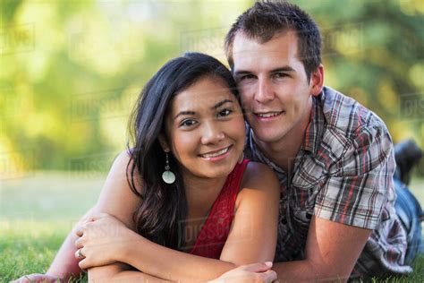 Mixed Race Couple Spending Quality Time Together In A Park In Autumn St Albert Alberta