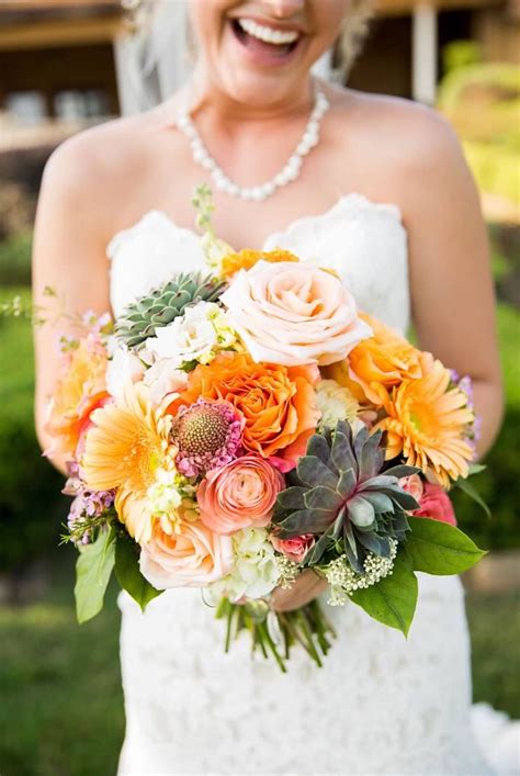 Purple flowers on a white wedding cake and table settings are simply captivating. June wedding bouquet! | Wedding, June wedding, Wedding ...
