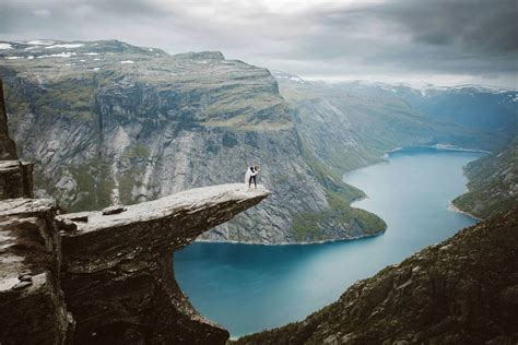 Epic Wedding Photos On Top Of Trolltunga After 14 Hours Hike By Priscila Valentina And Newlyweds
