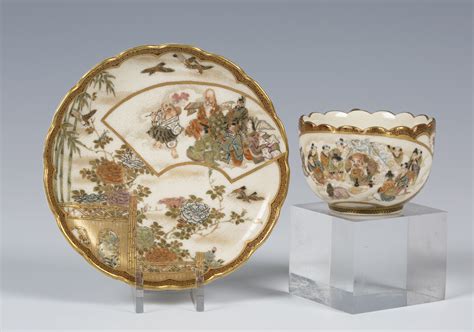 A Japanese Satsuma Earthenware Cabinet Cup And Saucer By Kaizan Meiji