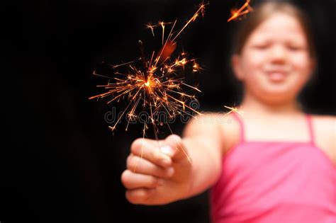 Girl Holding Yellow Sparkler Firework With Hand Stock Image Image Of