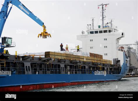 Timber Being Unloaded From The Ernst Hagedorn Cargo Ship At Shoreham