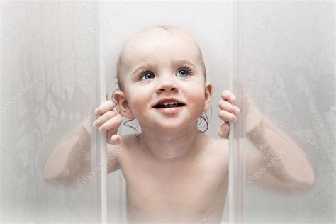 Little Girl In Shower Cabin — Stock Photo © Mahomahony 32556633