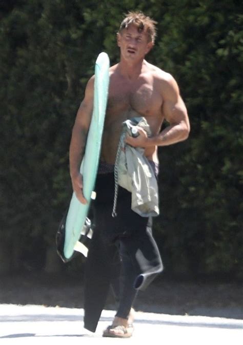 sean penn 58 shows off his toned abs during a relaxed surfing session in malibu toned abs