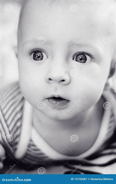 Baby With Eyes Wide Opened Stock Image Image Of Mouth 12732681