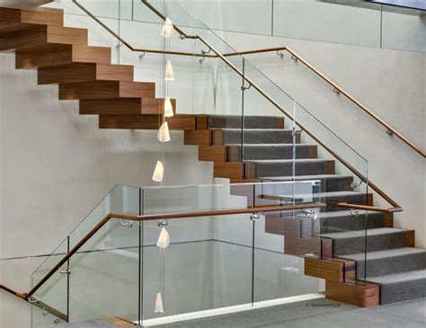 Floating Spiral Staircase With Glass Railing Increases Natural Light