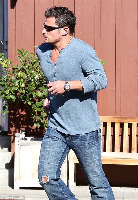 Nick Lachey Shows Off His Bulging Biceps As He Darts Across The Street