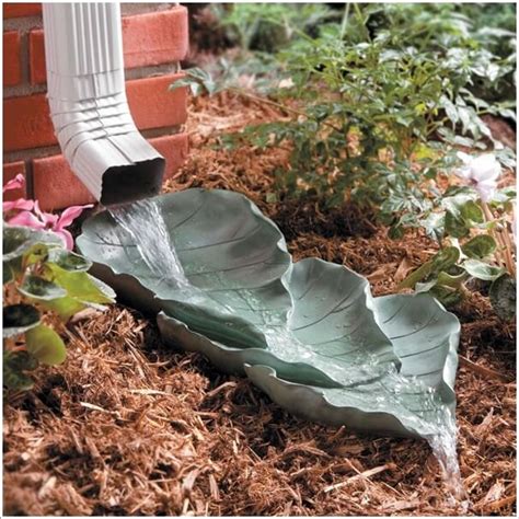 This gargoyle rain gutter protects your home's foundation by channeling water away from its base. 10 Clever Downspout Landscaping Ideas