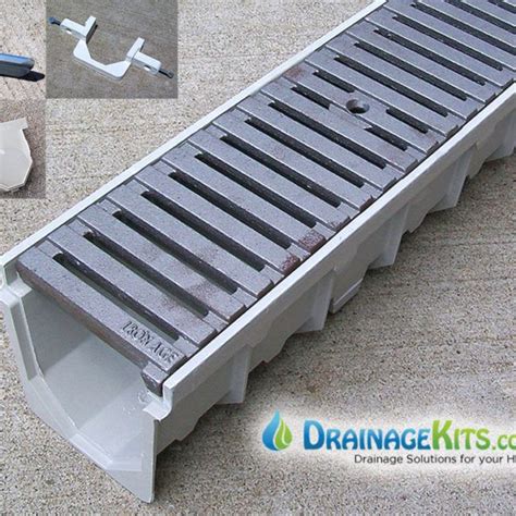 When talking about an area large enough to drive a vehicle on i wouldn't consider any option as easy or cheap. 5" Driveway Drain w/cast iron grates - Regular Joe | Driveway drain, Yard drainage, Drainage