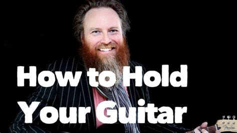 Home guitar beginner guitar lessons how to hold a guitar the correct way. How To Hold Your Guitar (Guitar) - YouTube