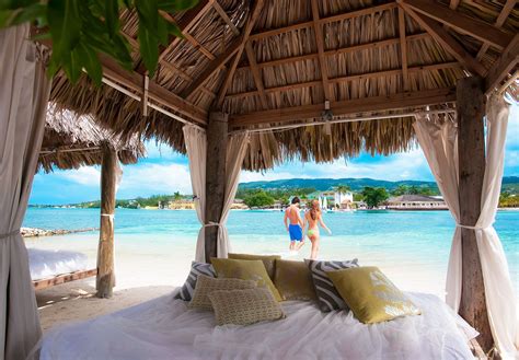 relax in a private cabana at water s edge on sandals island luxury relax private resort