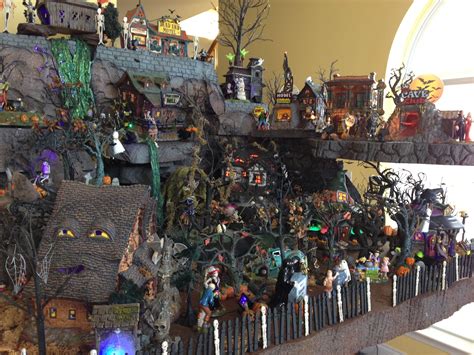 Look at these pictures, and all you can think about is how much chic and warmth this wall art brings to your christmas living room. Halloween village display, Lemax halloween village, Diy ...