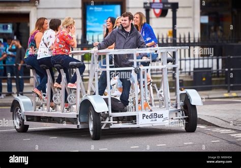 A Group Tour In London Aboard A Pedibus Or Group Cycle Stock Photo Alamy